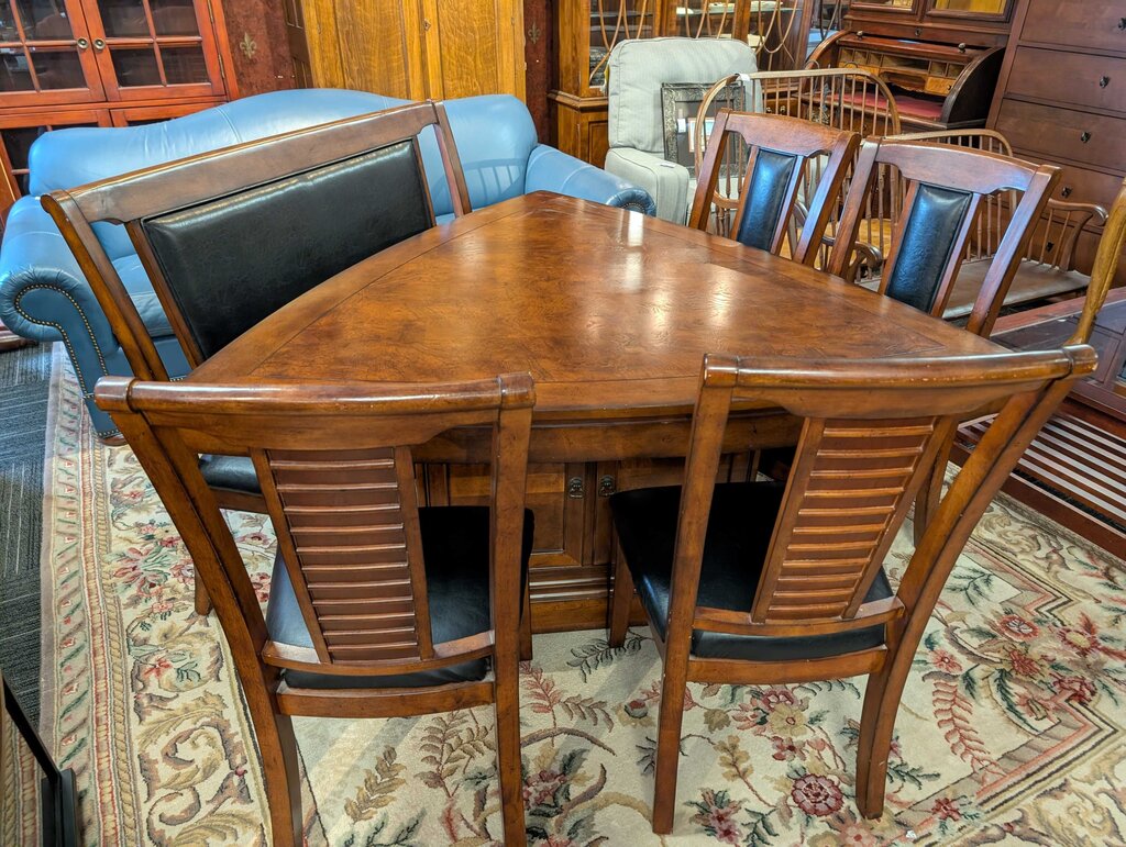 Corner Table With Four Chairs And A Bench