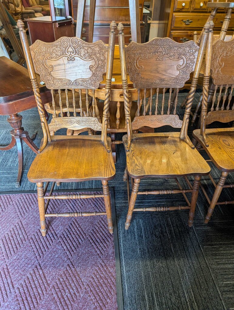 Four Oak Pressed Back Chairs