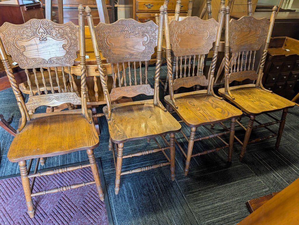Four Oak Pressed Back Chairs