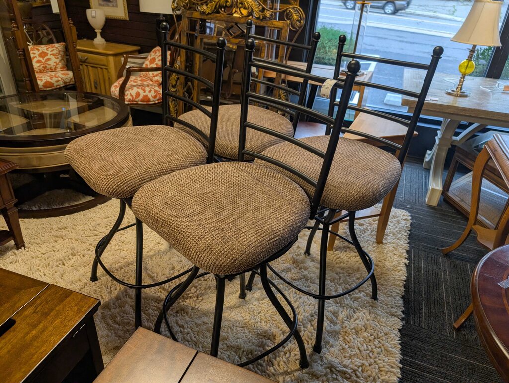 Four 30" Swivel Bar Stool by Ashley "Antigo"