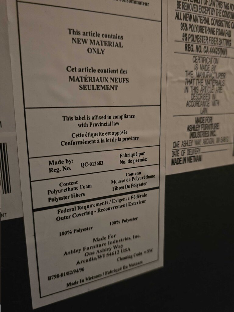 King Upholstered Tufted Panel Bed by Ashley