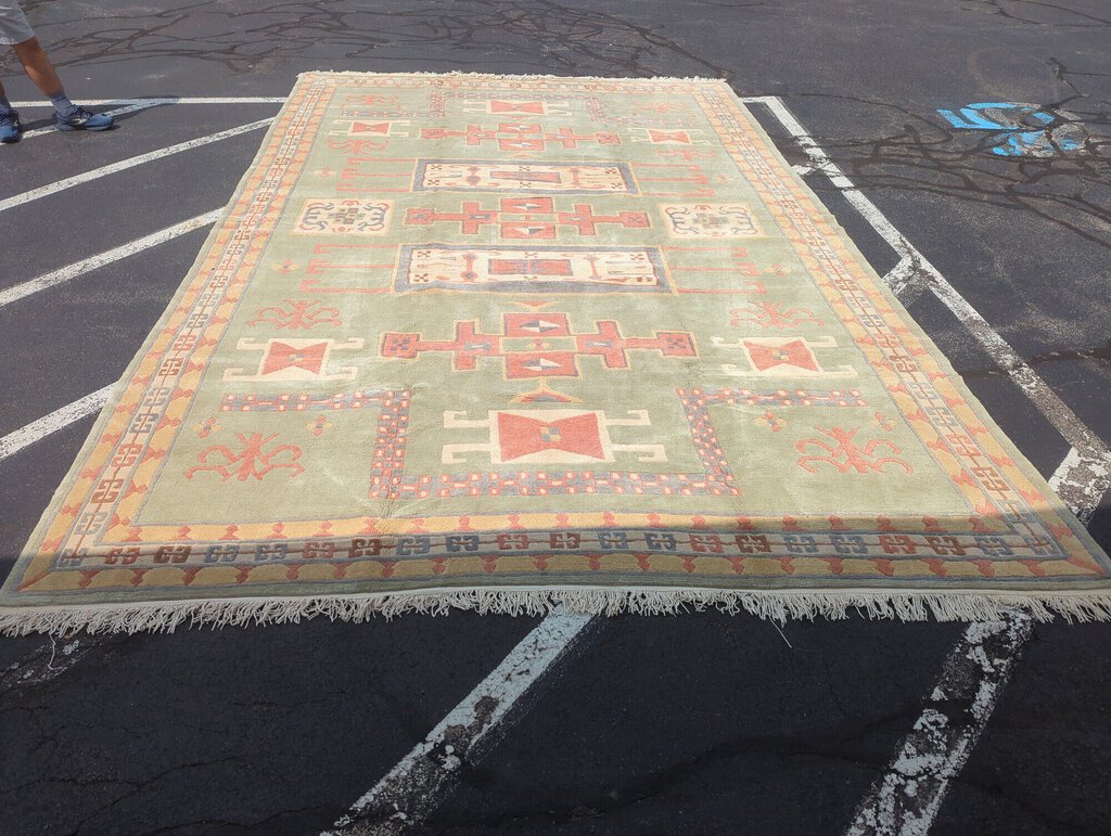 Hand knotted wool area rug